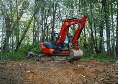 Excavation crew clearing land for development