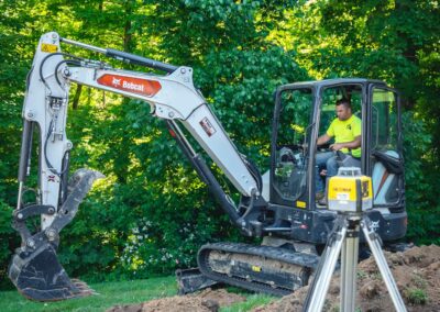 Excavation crew clearing land for development