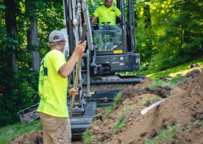 Excavation crew clearing land for development