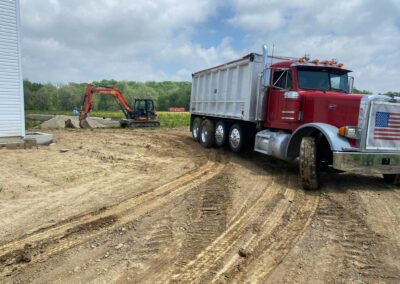 Dump truck being loaded with dirt