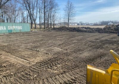 Grading and leveling for construction site preparation