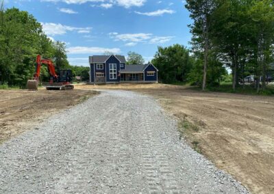 Gravel pathway winding through a backyard