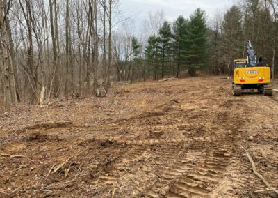 Excavator preparing site for new development
