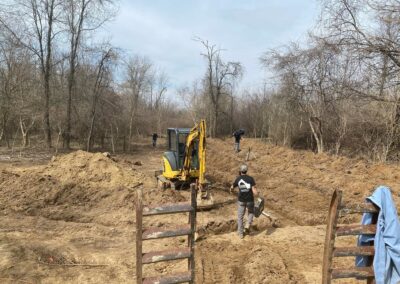 Excavator preparing site for new development