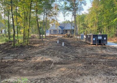 Heavy equipment flattening land for building