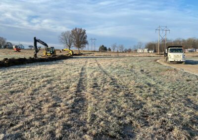 Land clearing equipment removing trees and brush
